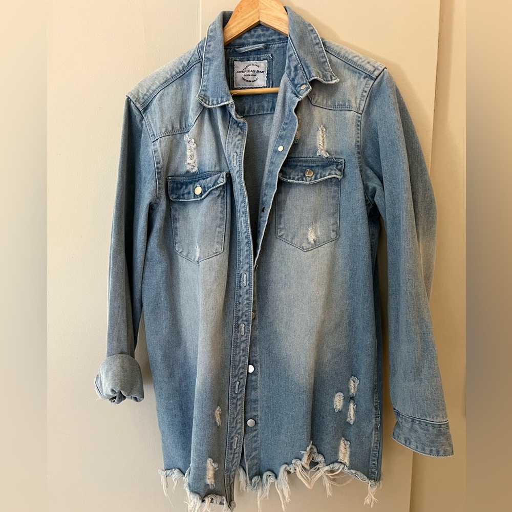 Heavy denim shirt.  Slightly destructed.  Worn once.